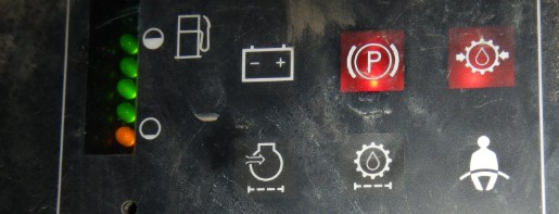What are case 440 skid steer warning lights and symbols
